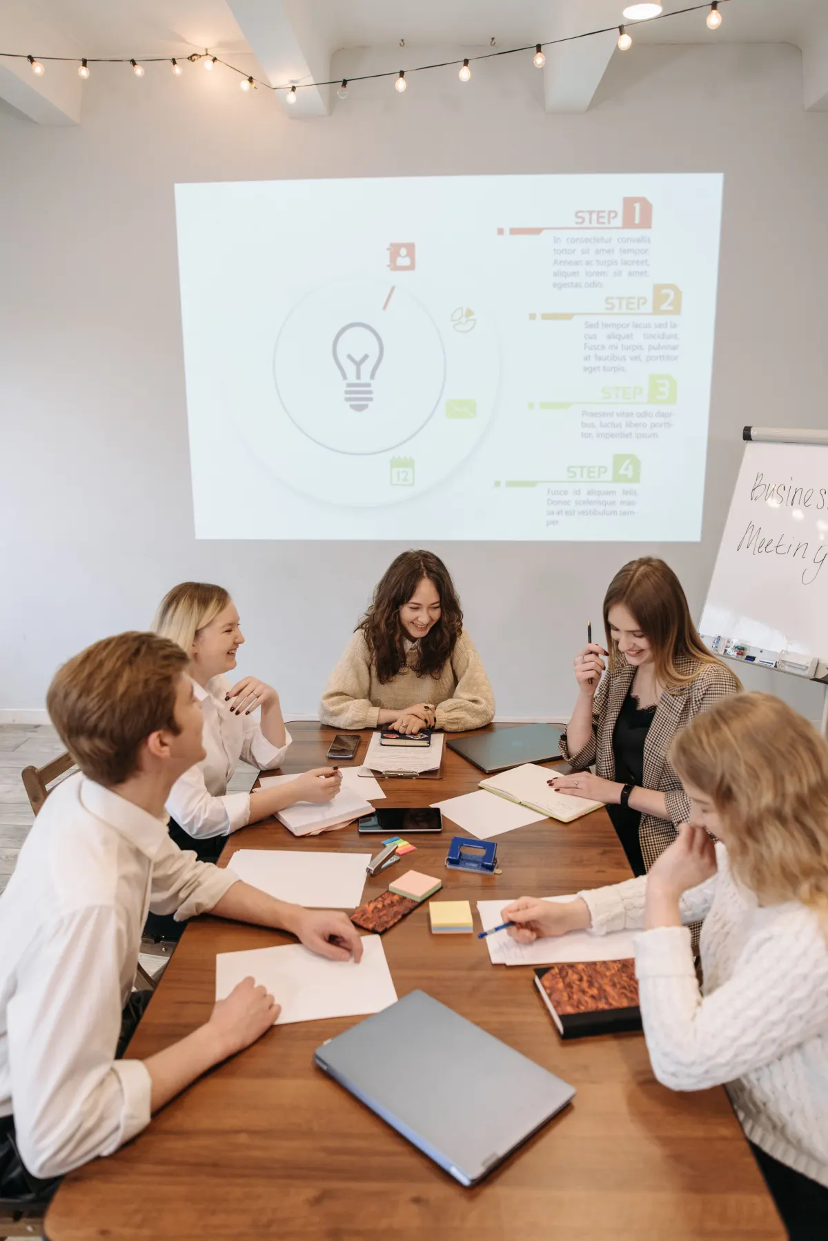 People collaborating around a table during a planning session