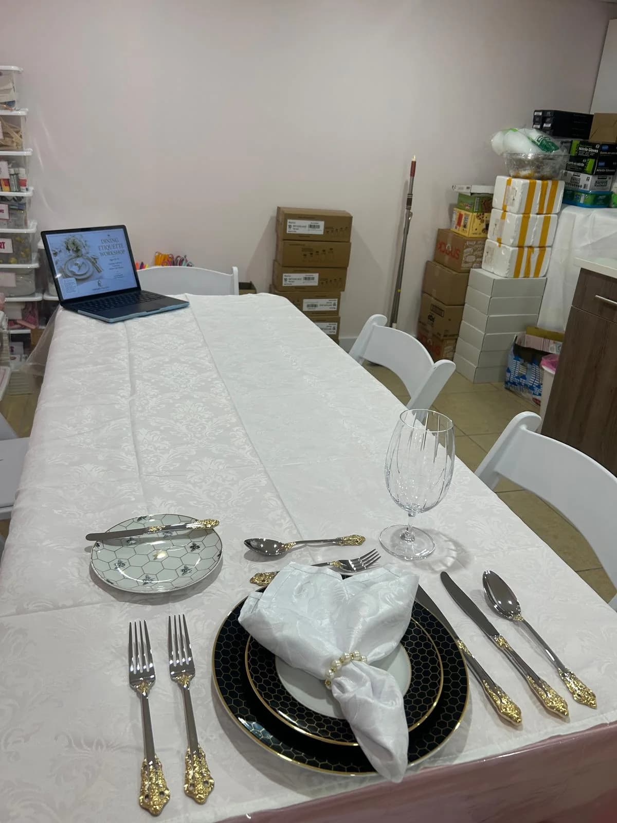 A dining table arranged for etiquette practice